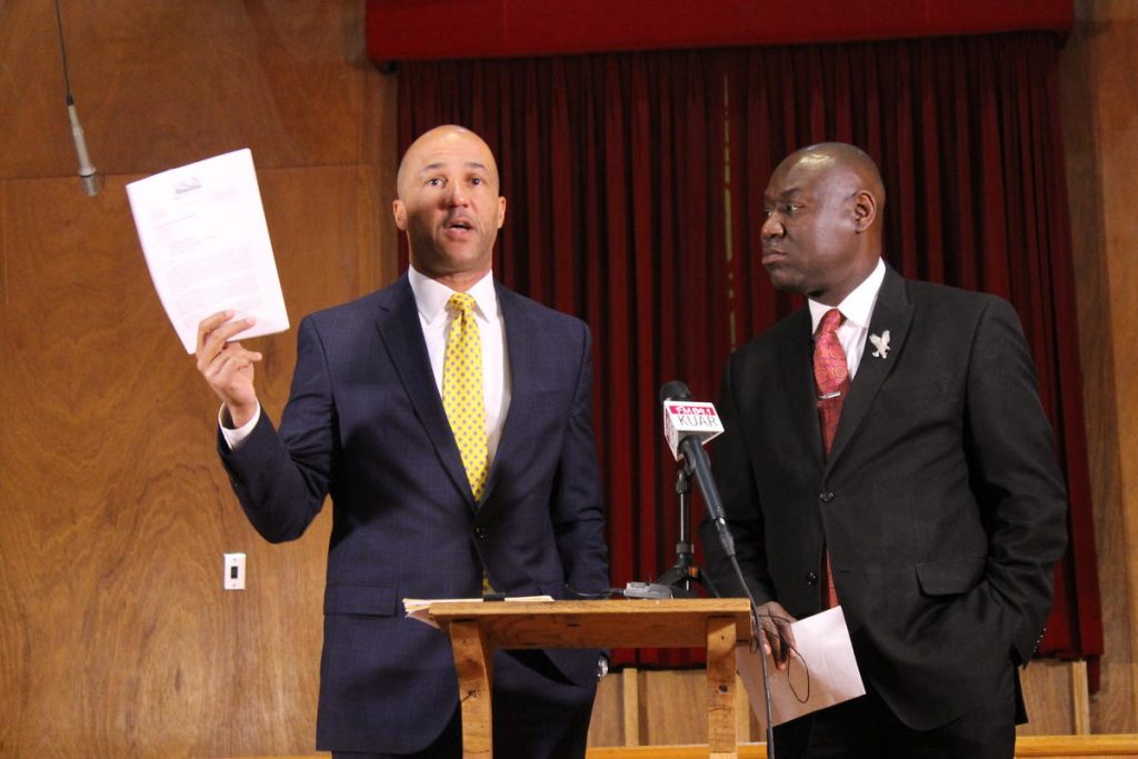 Civil rights attorneys Mike Laux (left) and Benjamin Crump at a press conference in December regarding the Little Rock Police Department's use of no-knock raids. CREDIT MICHAEL HIBBLEN / KUAR NEWS